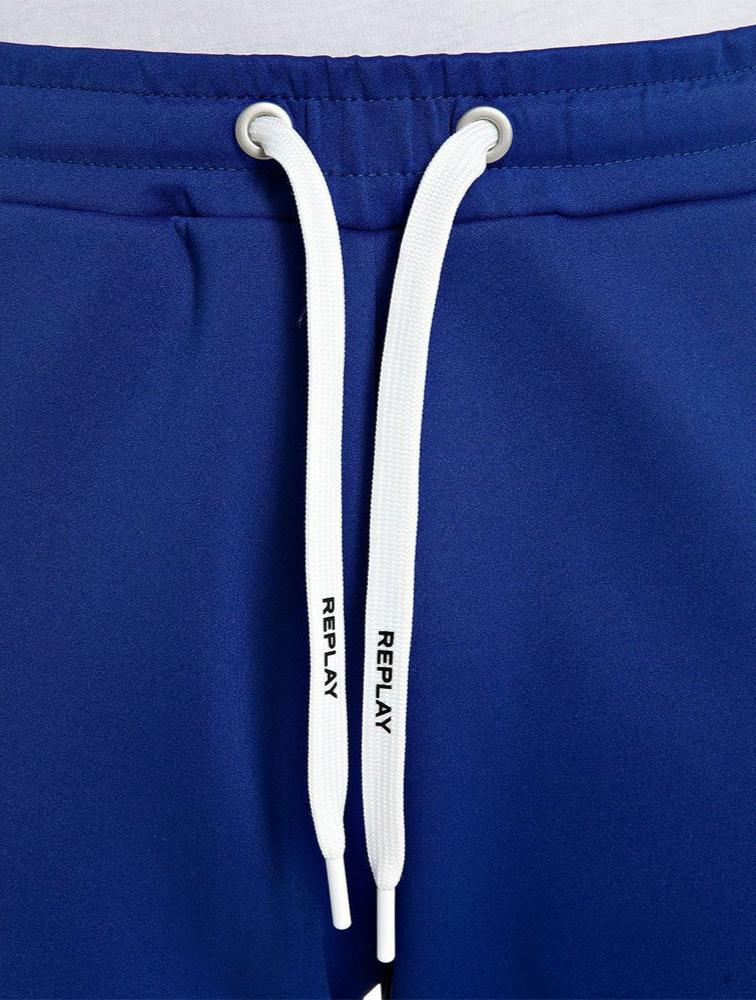 JOGGER TROUSERS WITH CONTRASTING-COLOURED BANDS